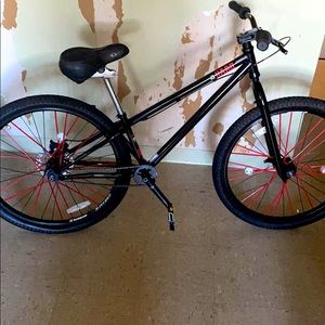 26 inch bmx wheelie bike with disc brake and red strips installed barely used